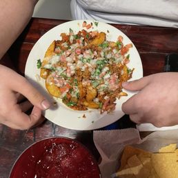 Papas Dorados (French fries) with queso chorizo & pico Papas Dorados (French fries) with queso chorizo & pico