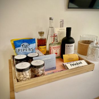Short Stories Hotel - Mini bar with unique items, presentation is basic. - Hotels Near Me - Los Angeles, California Short Stories Hotel - Mini bar with unique items, presentation is basic. - Hotels Near Me - Los Angeles, California