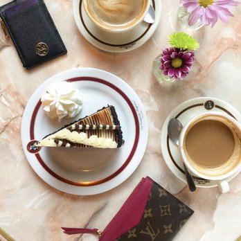 Cafe Intermezzo - White and black cake - Coffee & Tea Near Me - Dunwoody, Georgia