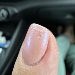 Envy Nails & Spa - They put regular polish on top of a gel manicure.