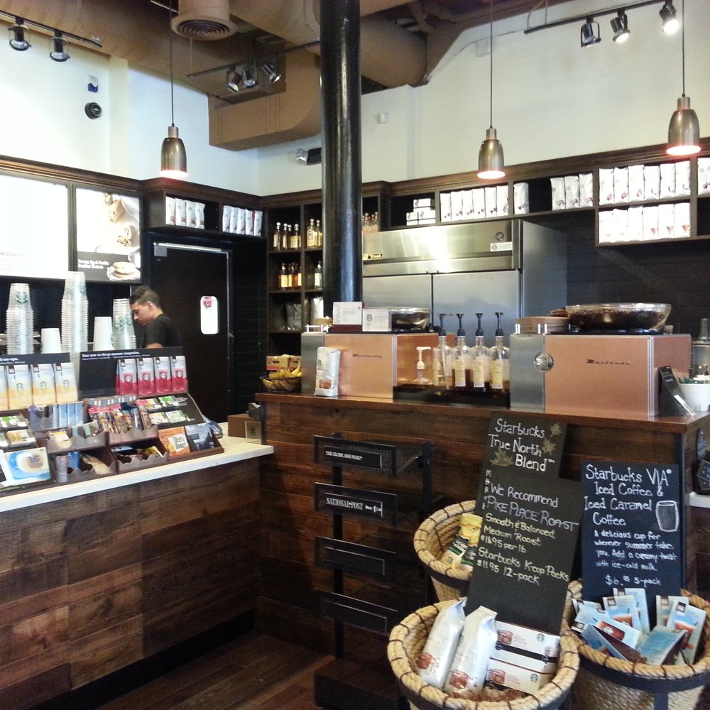 Starbucks - a coffee shop with lots of items on display - Coffee & Tea Near Me - Brampton, Ontario Starbucks - a coffee shop with lots of items on display - Coffee & Tea Near Me - Brampton, Ontario