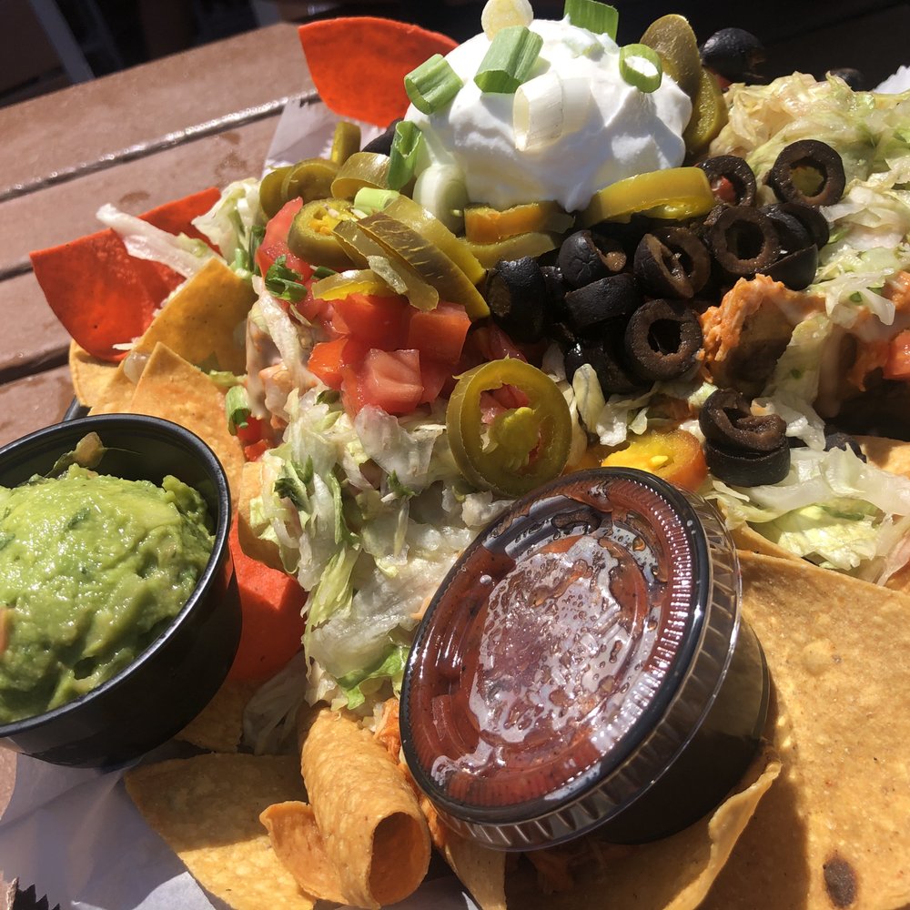 Coconuts On The Beach - Ultimate Nachos w/ Chicken (a must) - Bars Near Me - Cocoa Beach, Florida Coconuts On The Beach - Ultimate Nachos w/ Chicken (a must) - Bars Near Me - Cocoa Beach, Florida