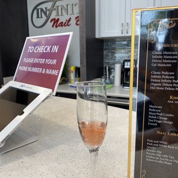 Infinity Nail Bar - 2 complimentary glasses of wine - Nail Salons Near Me - Pensacola, Florida