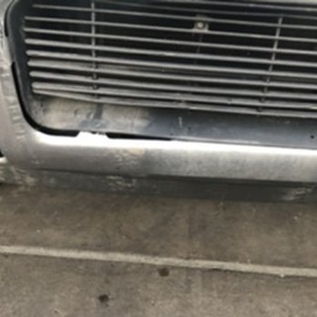 Cobblestone Car Wash Express - Broken grill and ripped off license plate. Not too mention the vehicle is still dirty after the wash - Car Wash Near Me - Aurora, Colorado