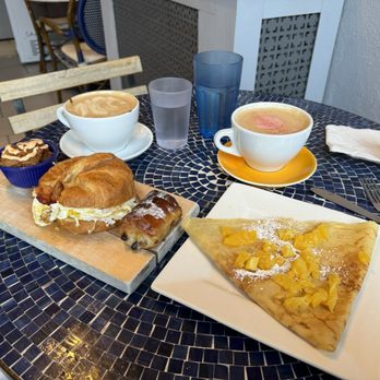 Café Miriam- City Park - Creme de Chantilly crepe with honey rose latte and a breakfast sandwich with potatoes and a chocolate croissant and mocha - Coffee & Tea Near Me - Denver, Colorado Café Miriam- City Park - Creme de Chantilly crepe with honey rose latte and a breakfast sandwich with potatoes and a chocolate croissant and mocha - Coffee & Tea Near Me - Denver, Colorado