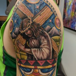 Looking Glass Tattoo & Gallery