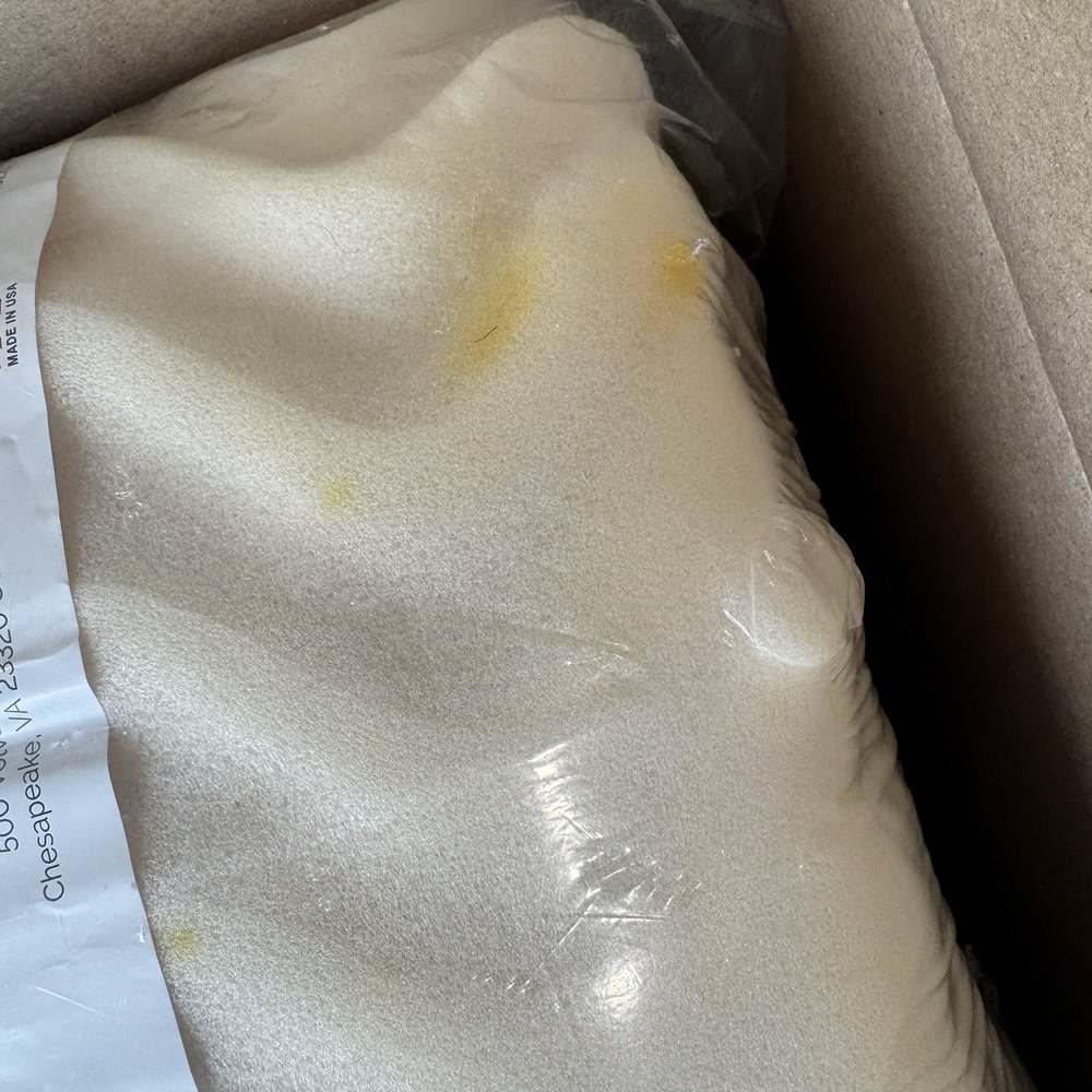 Clutter - Urine on SEALED foam mattress topper INSIDE cardboard box - Self Storage Near Me