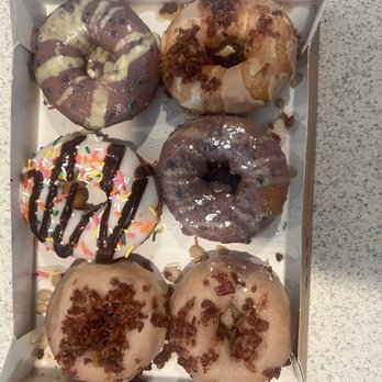 Duck Donuts - We ordered maple bacon, beach ball, blueberry lemonade, maple bacon, blueberry pancake and maple bacon with caramel drizzle. - Coffee & Tea Near Me - Summerville, South Carolina