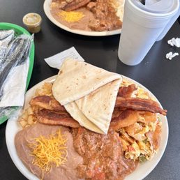 Migas with 1/3 lb Carne Guisada Migas with 1/3 lb Carne Guisada