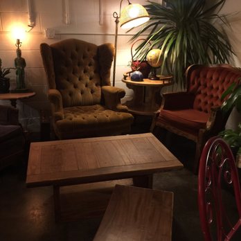 The Place - a living room with a couch, chair, table and lamp - Cideries Near Me - Portland, Oregon