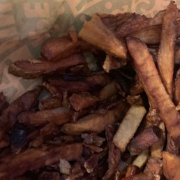 These French fries were burnt May have been left over from the day before These French fries were burnt May have been left over from the day before