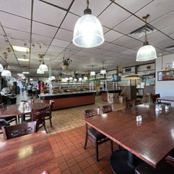 Bombay Grill And Buffet - Busy takeout but notify staff if no one approaches after 10 minutes; they may not have seen you