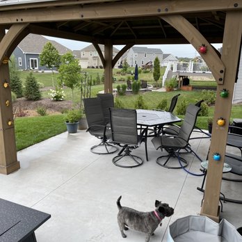 Wendland Landscape Services - a dog on a patio - Nurseries & Gardening Near Me - Germantown, Wisconsin