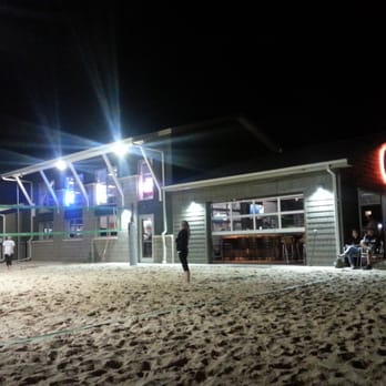 Headquarters Bar & Restaurant - Sand volleyball. .. - Sports Bars Near Me - Oregon, Wisconsin