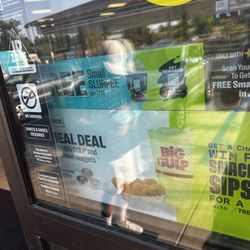 7-Eleven - Free Slurpee on 7/11 and they charge us. There's was a sign that say free slurpee on the door. Bad management!!!