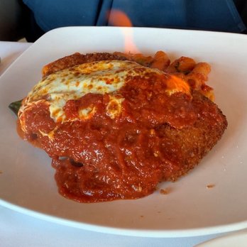 Aria Restaurant - Chicken Parmigiana with sauce and cheese flambéed tableside - Italian Near Me - West Bloomfield Township, Michigan