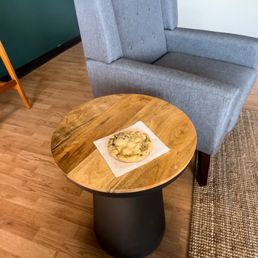 a chair and a table in a living room