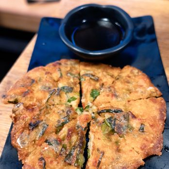 Modoo - Chicken & Noodle Bar - Korean Seafood Pancake: $7.99 ($8.70 with tax) - Chicken Wings Near Me - Bayside, New York Modoo - Chicken & Noodle Bar - Korean Seafood Pancake: $7.99 ($8.70 with tax) - Chicken Wings Near Me - Bayside, New York