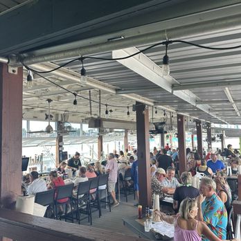 Rusty Bellies - Outdoor seating & bar - Seafood Near Me - Tarpon Springs, Florida Rusty Bellies - Outdoor seating & bar - Seafood Near Me - Tarpon Springs, Florida