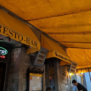 Homard Fou - a restaurant with a yellow awning - Seafood Near Me - Montreal, Quebec Homard Fou - a restaurant with a yellow awning - Seafood Near Me - Montreal, Quebec