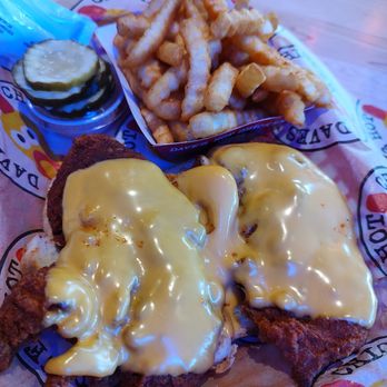 Dave's Hot Chicken - Chicken tenders with cheese, fries, pickles and sauce. - Chicken Shop Near Me - Tampa, Florida Dave's Hot Chicken - Chicken tenders with cheese, fries, pickles and sauce. - Chicken Shop Near Me - Tampa, Florida