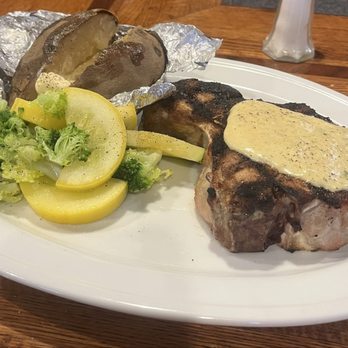Carolina Steak & Rib - 16oz bone in pork chop, baked potato, seasonal mixed vegetables - Steakhouses Near Me - Lincolnton, North Carolina Carolina Steak & Rib - 16oz bone in pork chop, baked potato, seasonal mixed vegetables - Steakhouses Near Me - Lincolnton, North Carolina