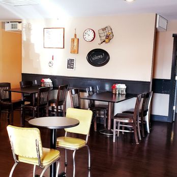 Red Door Coffee - tables and chairs in a coffee shop - Coffee & Tea Near Me - West Point, Nebraska