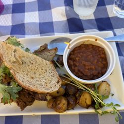 Tidal Cafe - Beef Brisket Sandwich with a side of baked beans.