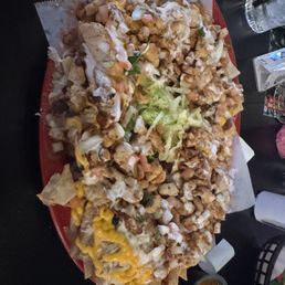 Loaded Chicken Nachos off App section of menu. Enough for 2 people to eat. CHECK THEM OUT !!! Loaded Chicken Nachos off App section of menu. Enough for 2 people to eat. CHECK THEM OUT !!!