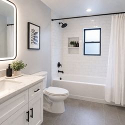 Lexington Painting - Freshly reglazed bathroom featuring a smooth, high-gloss bathtub and refinished tile walls, delivering a clean, modern look without the need