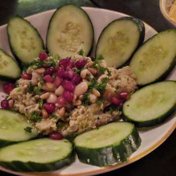 The Raymond 1886 - Babaghanouj $15: eggplant, cannellini beans, pignolias, pomegranate, mint-parsley oil, sumac, cucumbers (vg) - New American Near Me - Pasadena, California