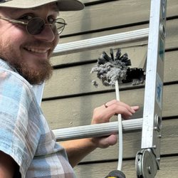 Emerald Wildlife Control - Dryer vent cleaning before dryer guard placement.
