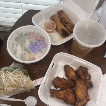 Pho 400 - Seafood pho, garlic chicken wings with fish sauce, and pork egg rolls - Vietnamese Near Me - New Brighton, Minnesota