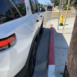 Garfield Elementary School - Parked in the red zone and front of  a  fire hydrant