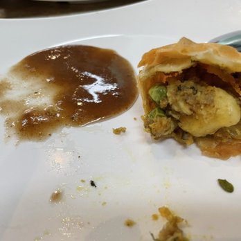Hyderabad Hub - Inside the pillowy goodness, tamarind chutney condiment. - Indian Near Me - Beaverton, Oregon