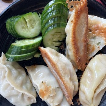 Dough Zone Dumpling House - Seattle ID - Sweet and Sour Cucumber, steamed shrimp and zucchini dumplings, seared Vegetable Pot Stickers and scallion pancakes - Shanghainese Near Me - Seattle, Washington
