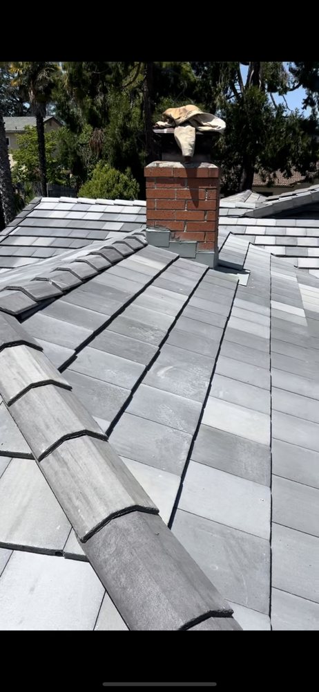 Slide of East Bay Roofing