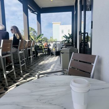 Causeway Coffee - Beautiful patio seating during a beautiful morning breeze - Coffee & Tea Near Me - Miramar Beach, Florida Causeway Coffee - Beautiful patio seating during a beautiful morning breeze - Coffee & Tea Near Me - Miramar Beach, Florida