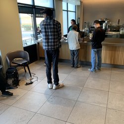 Starbucks - Interior. No tables only 3 chairs