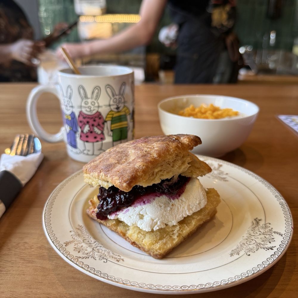 Town Biscuits - Biscuit with blueberry and goat cheese, grits, and coffee - Breakfast & Brunch Near Me - Oakland, California Town Biscuits - Biscuit with blueberry and goat cheese, grits, and coffee - Breakfast & Brunch Near Me - Oakland, California