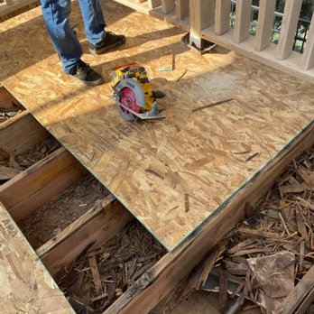 Unique Builds - a man working on a deck - Painters Near Me Unique Builds - a man working on a deck - Painters Near Me