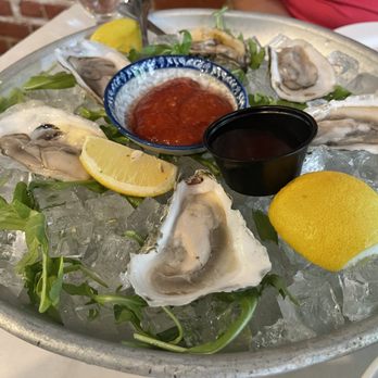 Reef Restaurant & Bar - Blue point oysters with Cocktail sauce and minuet sauce. - Seafood Near Me - Forest Hills, New York Reef Restaurant & Bar - Blue point oysters with Cocktail sauce and minuet sauce. - Seafood Near Me - Forest Hills, New York