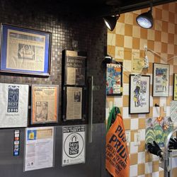 Mekong Delta Cafe - Awards on wall