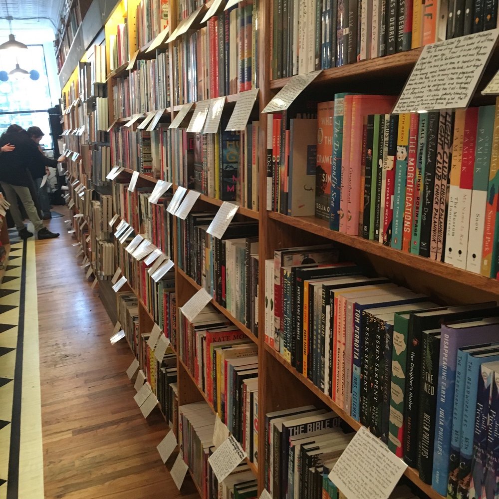 A view of the shelves of books downstairs