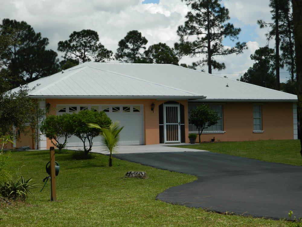 Slide of Hinspeter Roofing