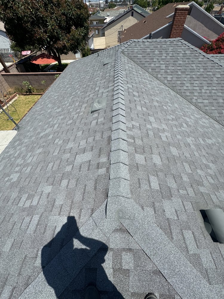 Slide of Precision Roofing