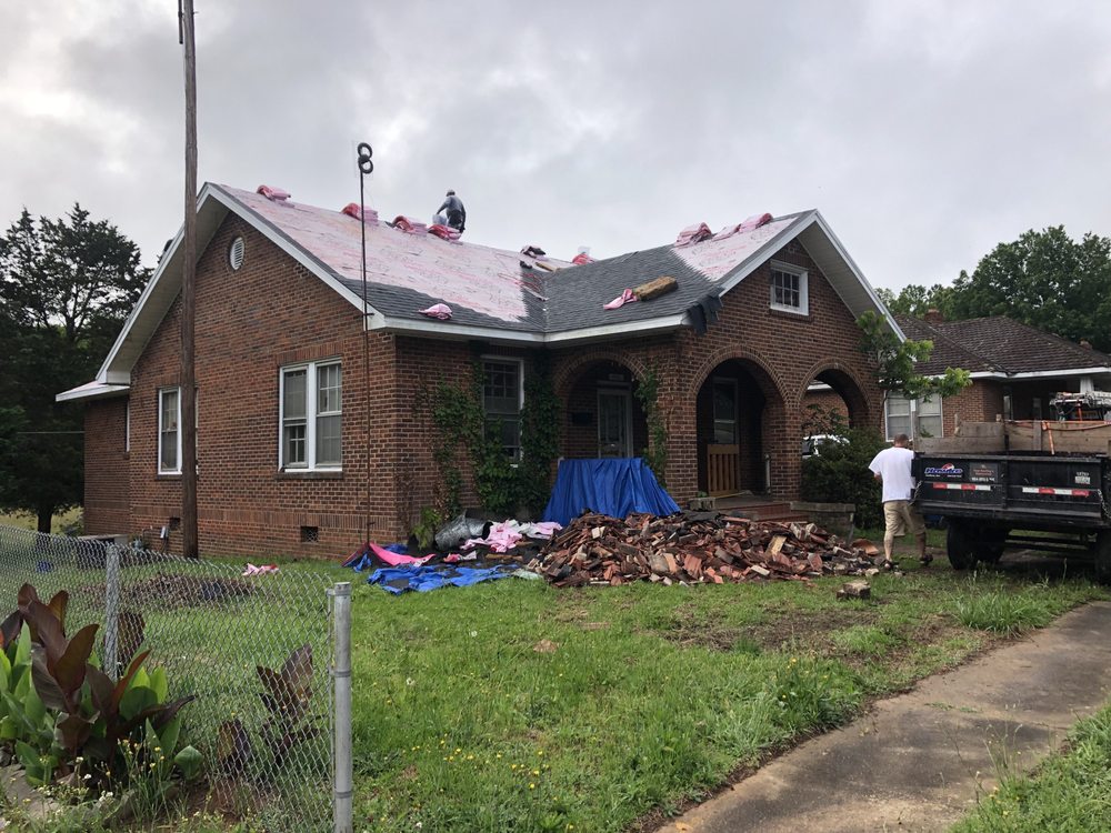 Slide of Ray's Roofing & Restoration