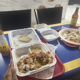 Well it was Salad, hummus, chicken Shawarma & Mix plate. Mango juice and Pineapple Ginger Well it was Salad, hummus, chicken Shawarma & Mix plate. Mango juice and Pineapple Ginger