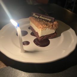Complimentary dessert, brownie cheesecake, and coconut Complimentary dessert, brownie cheesecake, and coconut