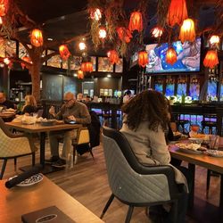 This is the bar area. Uniquely decorated with blown glass flowers Festive feel